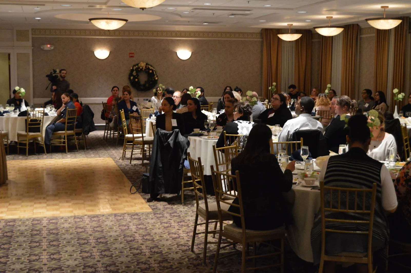 FSS graduates and their family members joined Compass staff and representatives from the Lynn Housing Authority and Neighborhood Development (LHAND) at Spinellis in Lynnfield.