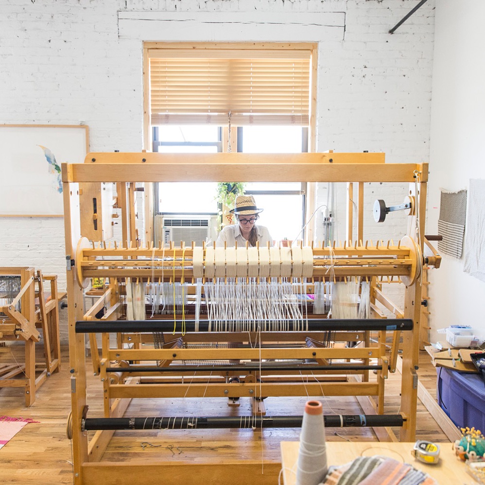 Working at Studio Herron in Chicago on Big Helen the AVL Dobby Loom. Photo Credit: Mike Killion for Saturate Chicago.