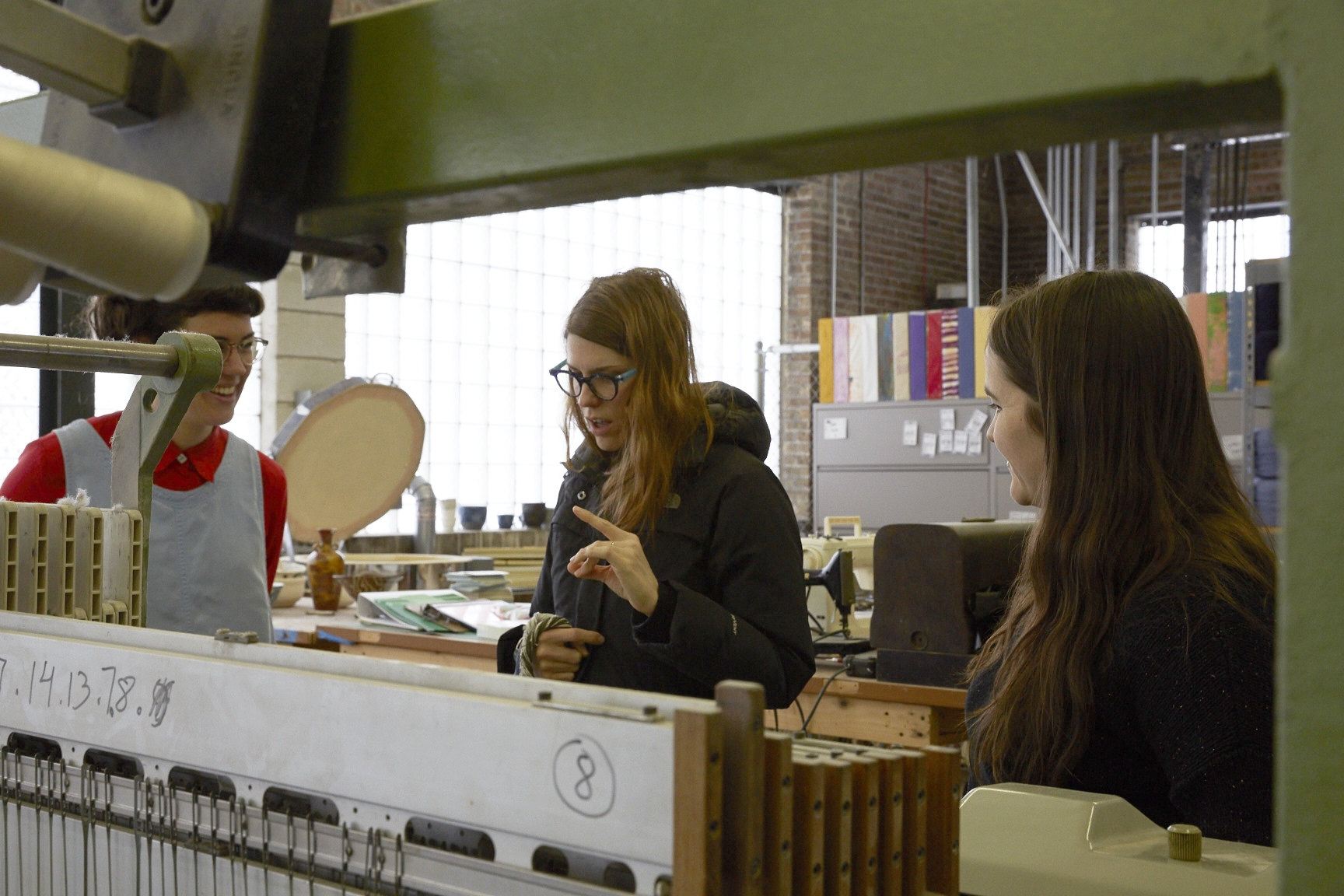 Photo By Jennifer Marx, 2016. Discussing weaving issues with The April Blanket at The Weaving Mill in Chicago, IL. Emily Winter left, Dee Clements Middle, Matti Sloman right.