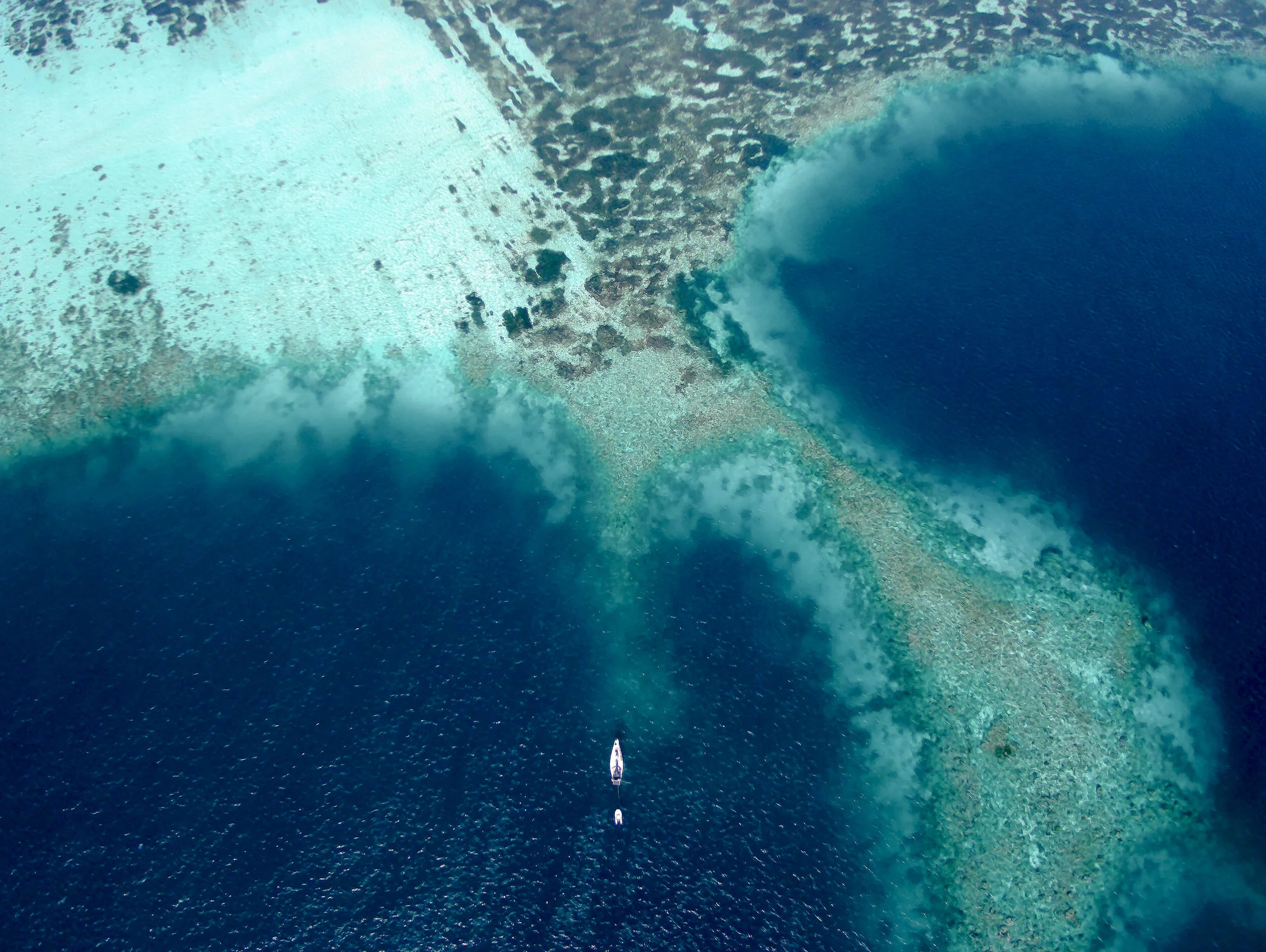 Anchored in an isolated atoll in Wakatobi, Indonesia. Photo courtesy of Amanda-Sailing.com.