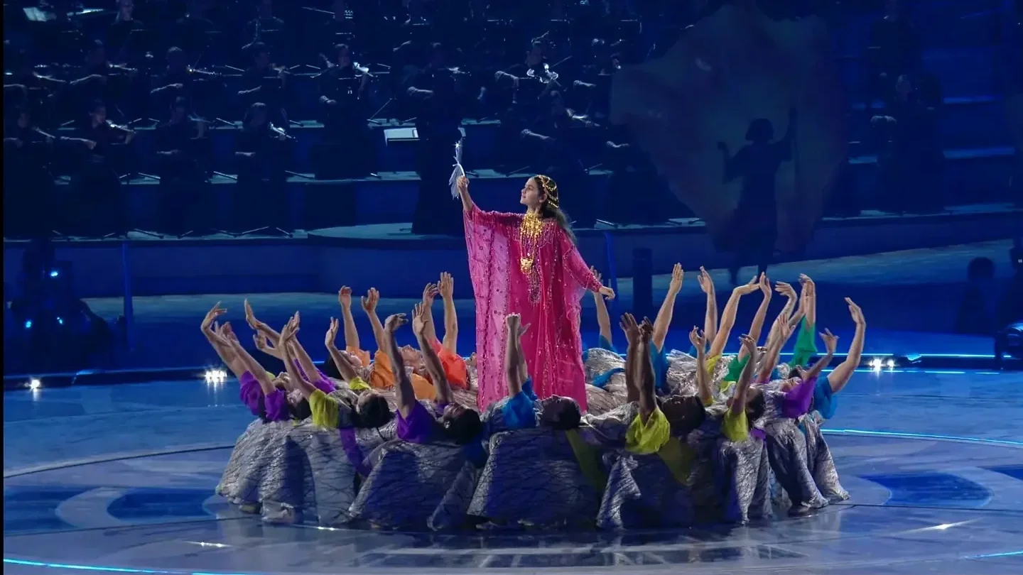 Ceremony performance with choreography – lead performer with ensemble dancers on stage