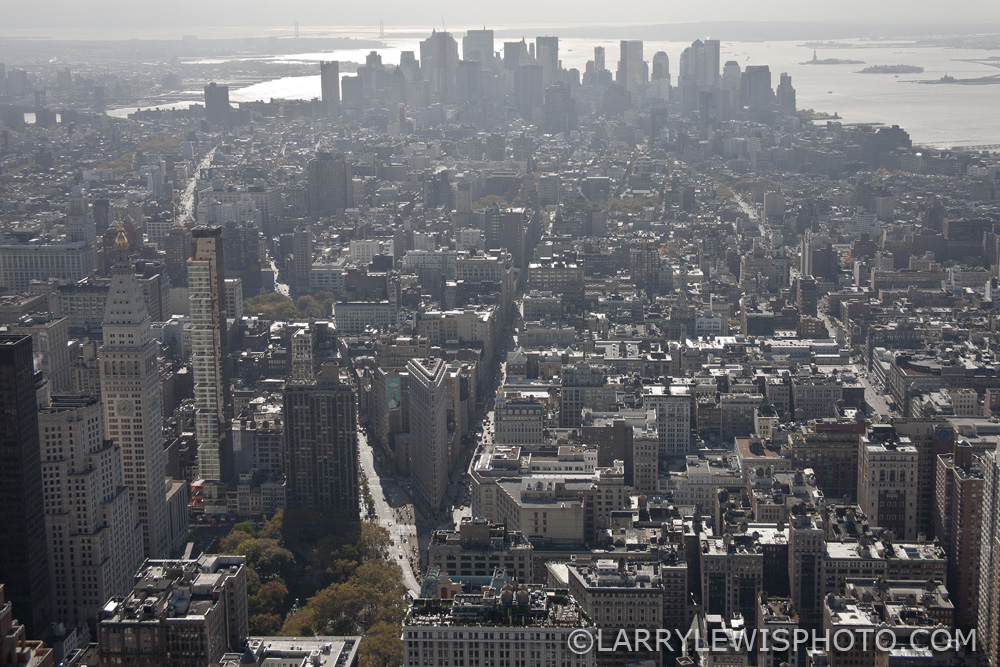 The New York Flatiron, lower left centre of the image, photographed from the Empire State Building in 2009.