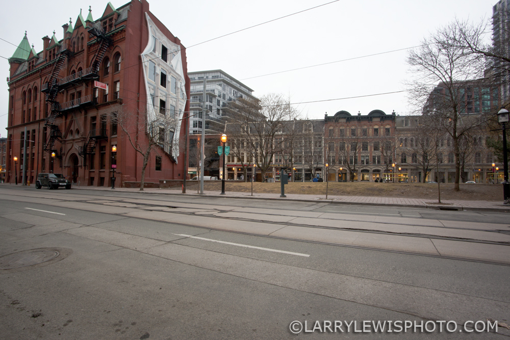 The Flatiron mural mirrors the Perkins Building across Front Street.