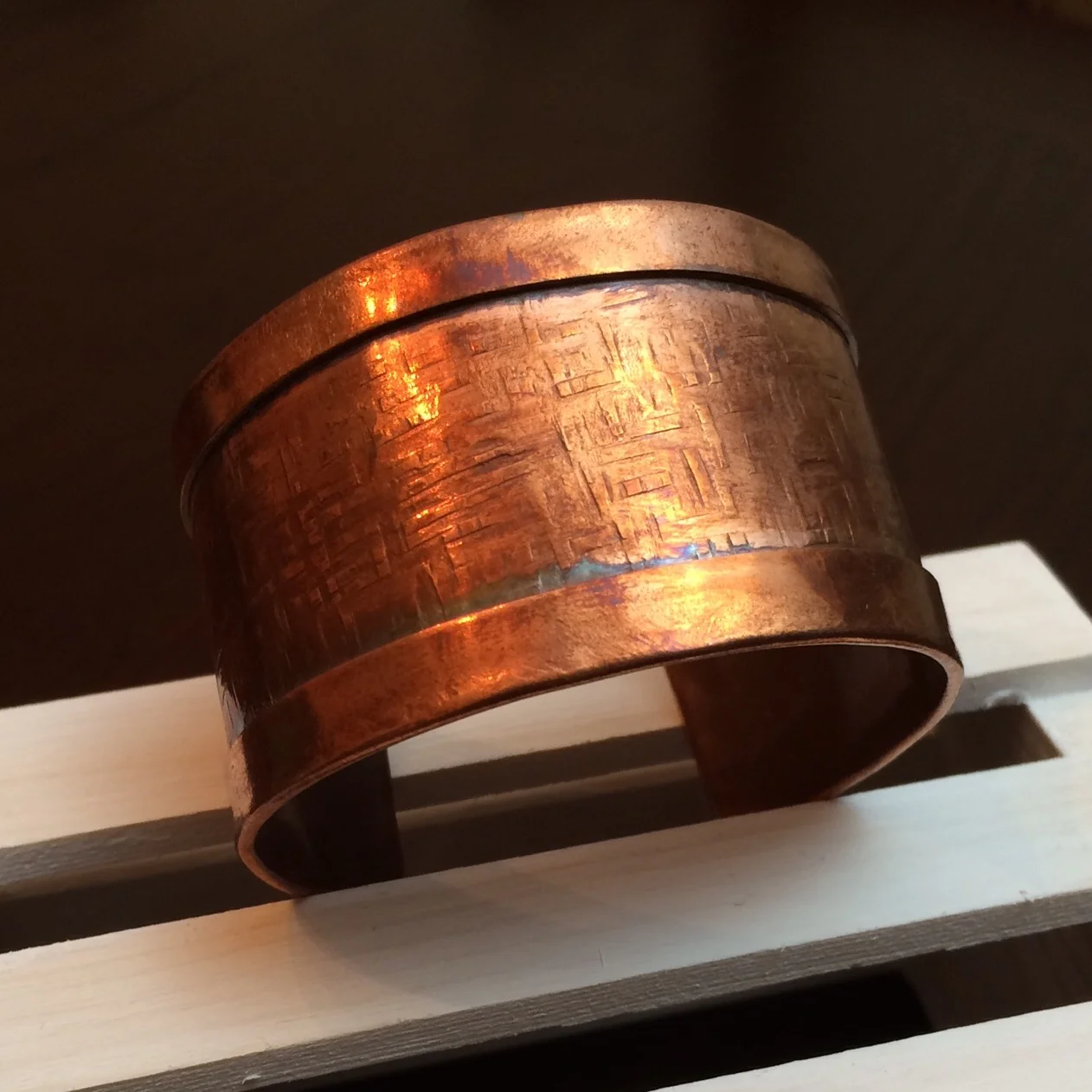 Hand Forged Wide Copper Cuff with Folded Edge.jpg