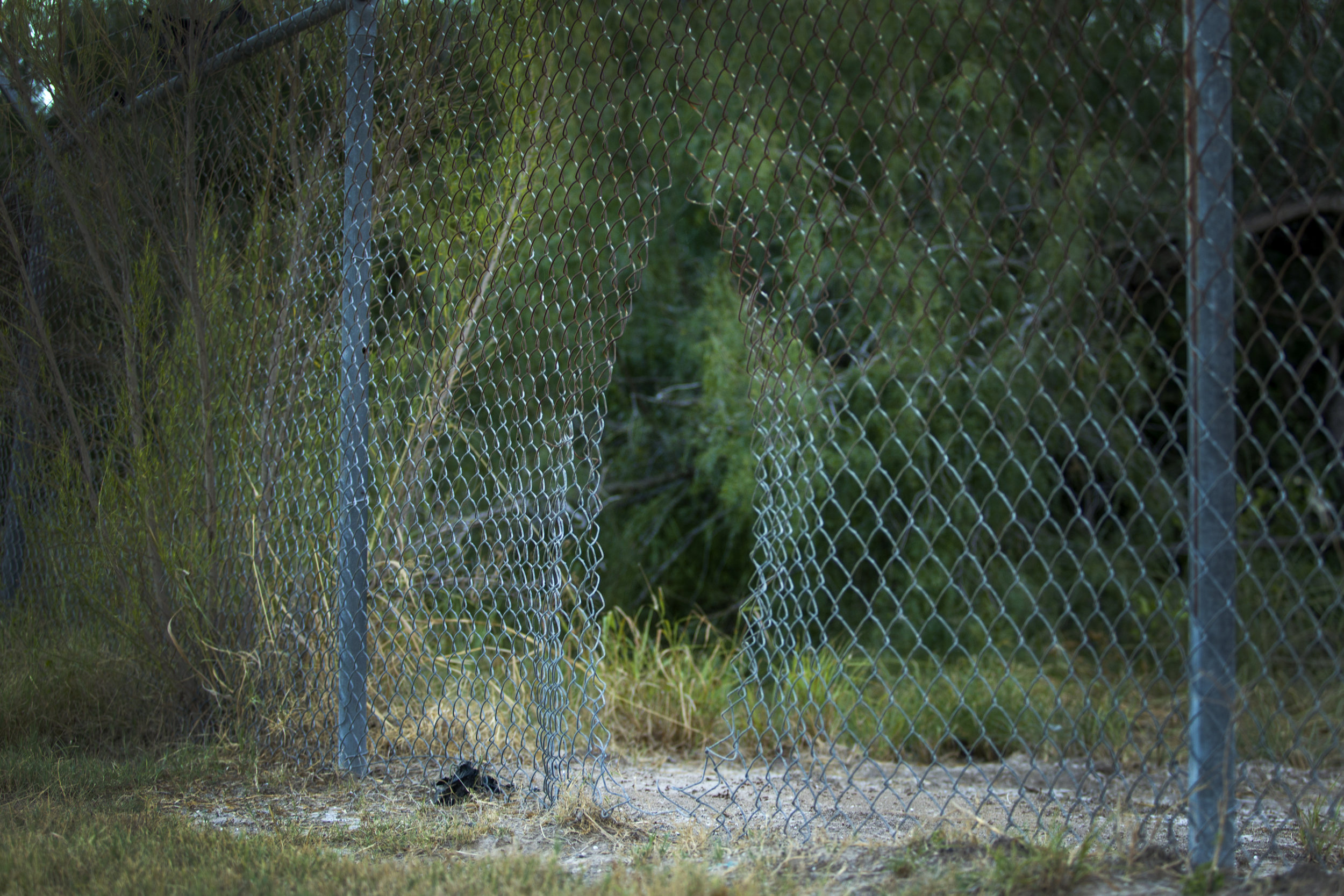  MCALLEN, TX. A hole cut in fencing near the Anzalduas International Bridge, spotted by Border Patrol. 