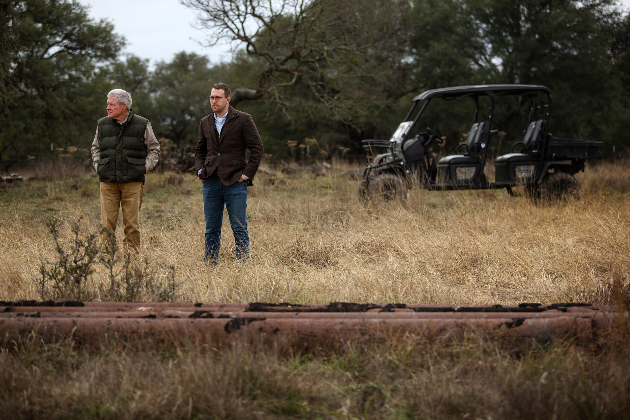  STONEWALL, TX. Landowner Andy Sansom (left) shows lawyer Jacob Merkord remnants of an old pipeline that ran through his property in the early 1900s. The new natural gas pipeline to be constructed by Kinder Morgan will run through Sansom’s property, 