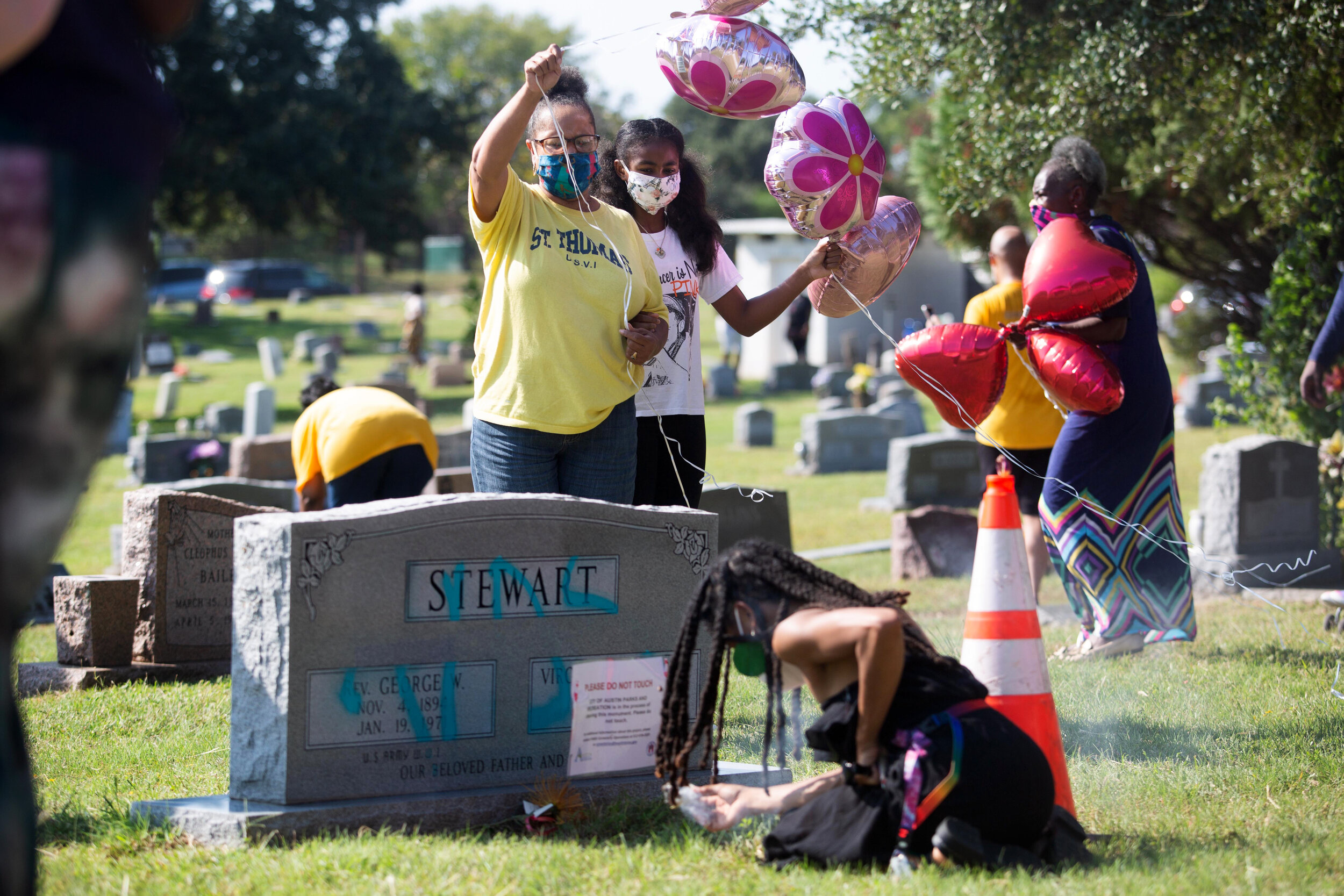  AUSTIN, TX. Sept. 27, 2020. People visit the graves of relatives whose headstones were vandalized at Evergreen Cemetery in East Austin, during a Celebration of Life event Sept. 27. 