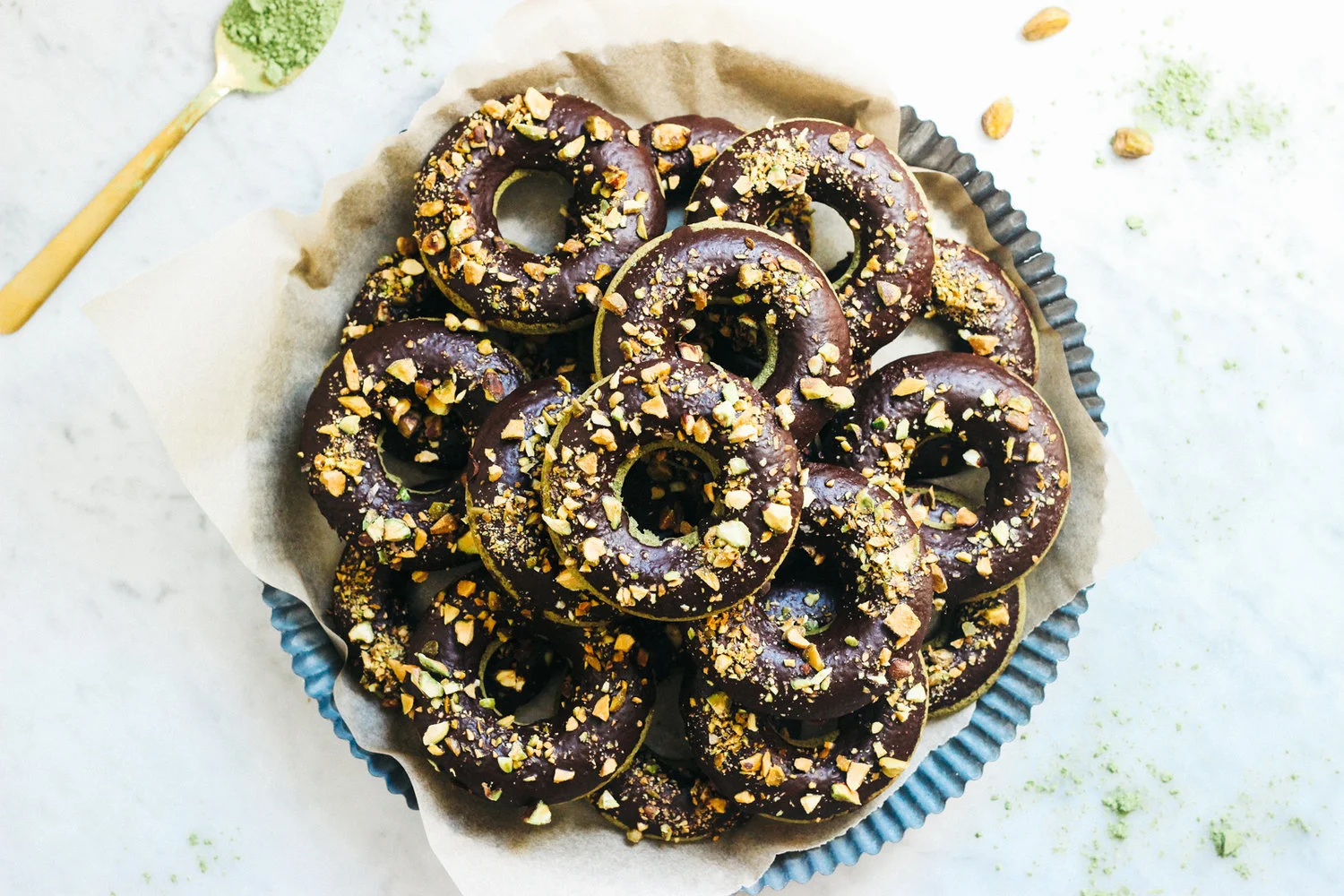 Matcha Donuts with a Cacao-Pistachio Glaze 