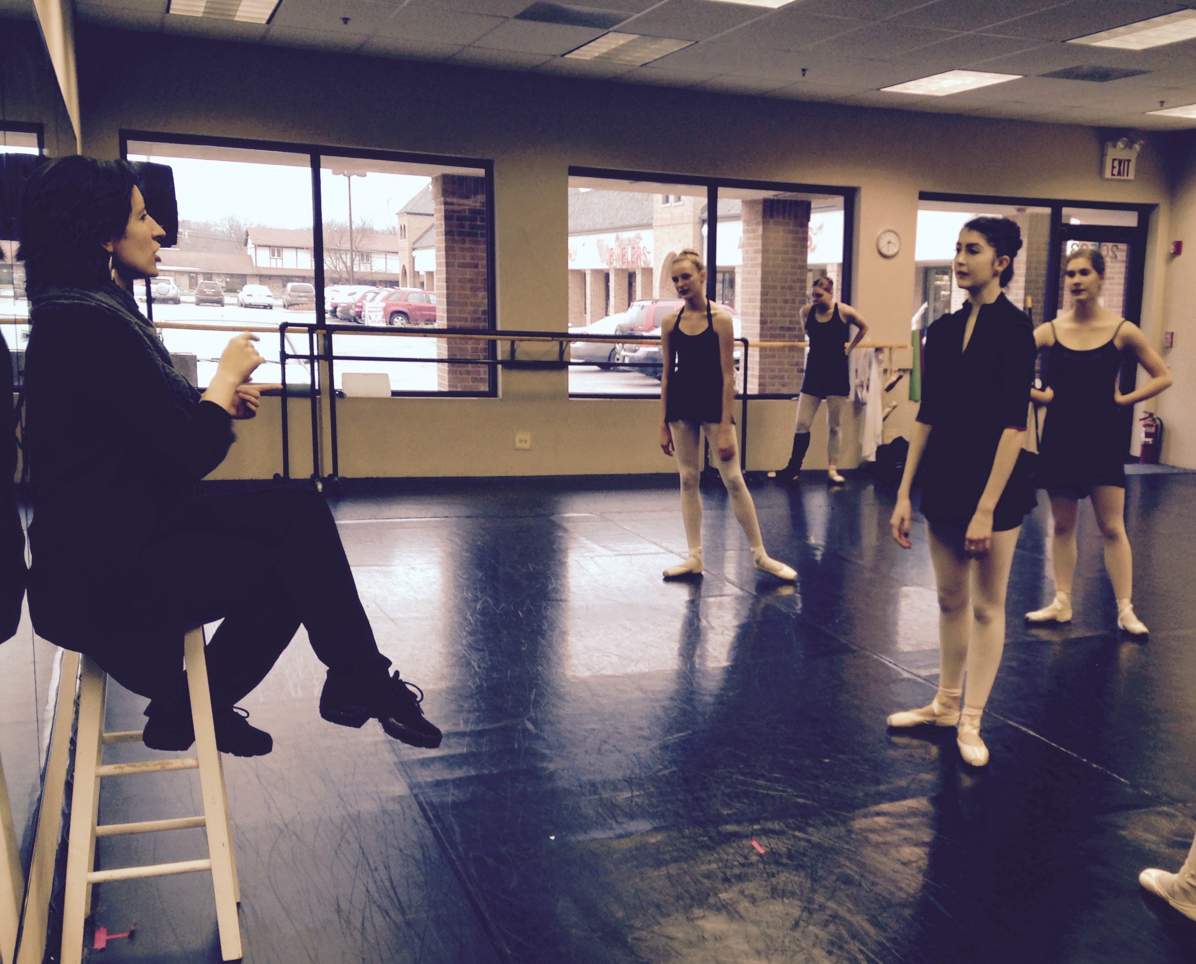 Ballet 5:8 Artistic Director Julianna Slager gives corrections to dancers after a rehearsal run of Beyond the Nutcracker