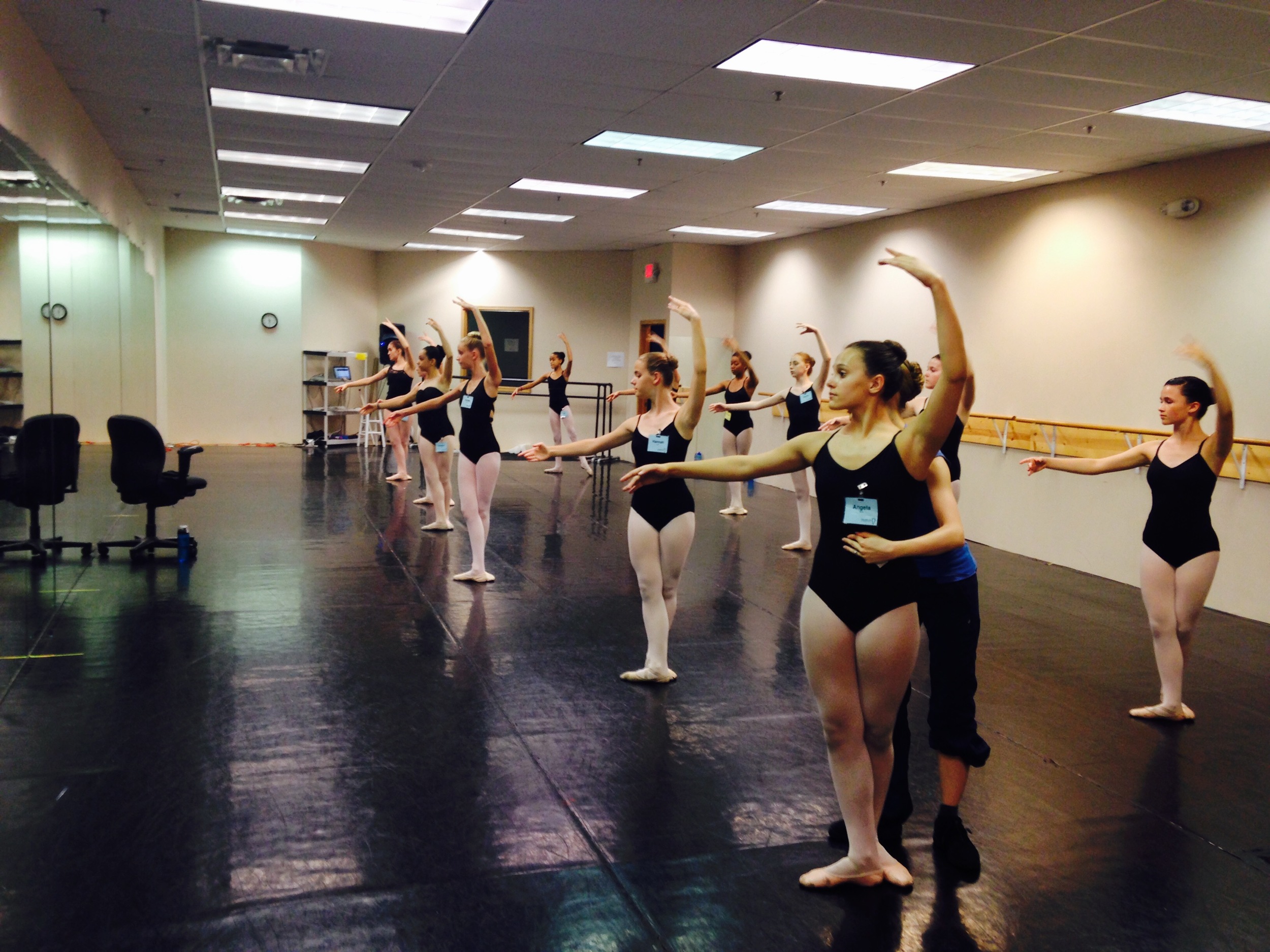 Ballet 5:8 Ballet Mistress Mrs. Lauren Ader-Cumpston gives a correction during Summer Intensive 2015.