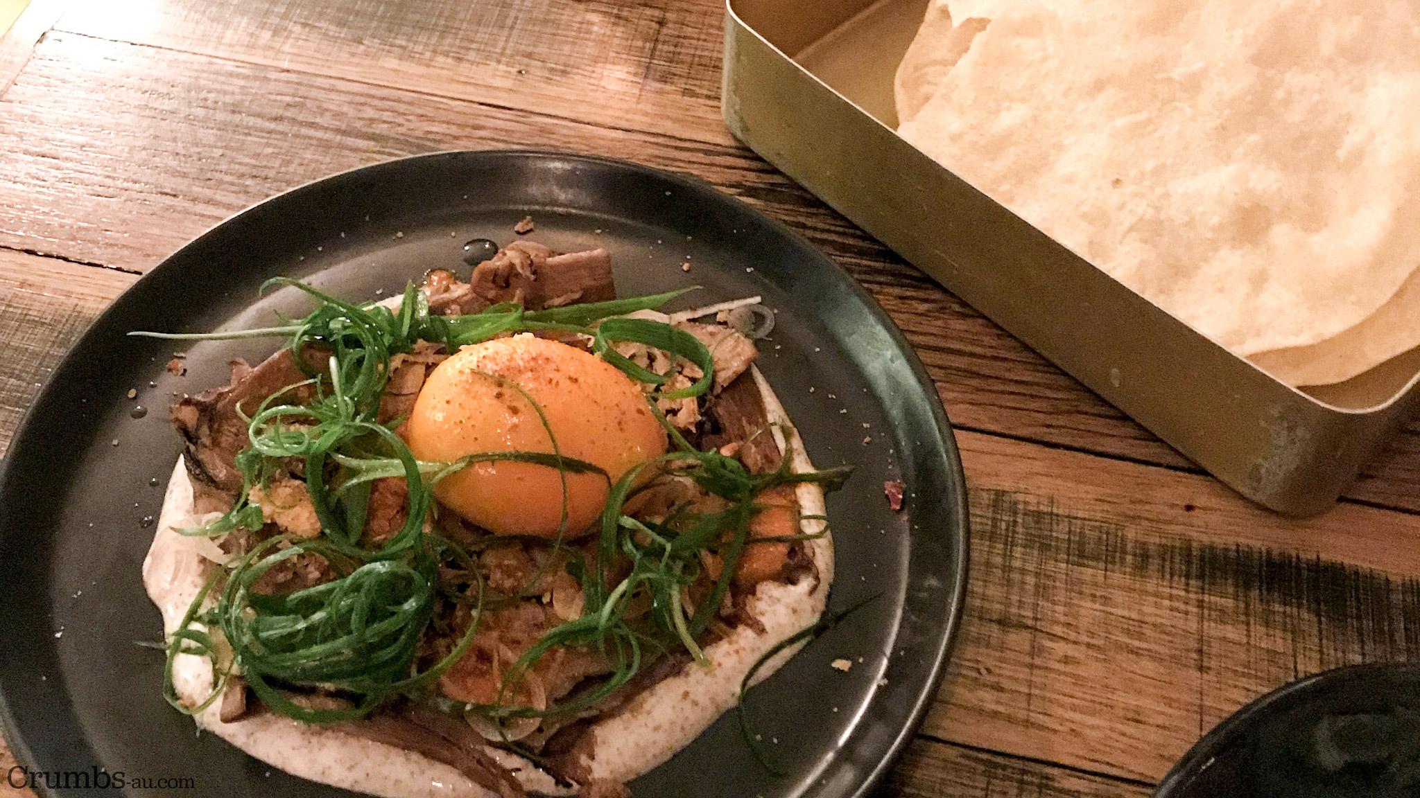 Beef Brisket, Vindaloo Hot Sauce, Papad, Soft Egg. 
