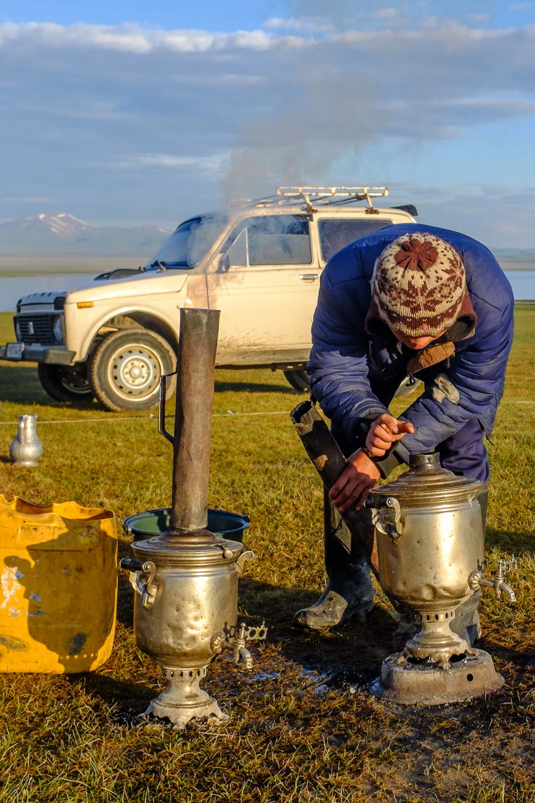 Igniting the samovars for the morning chai (tea)