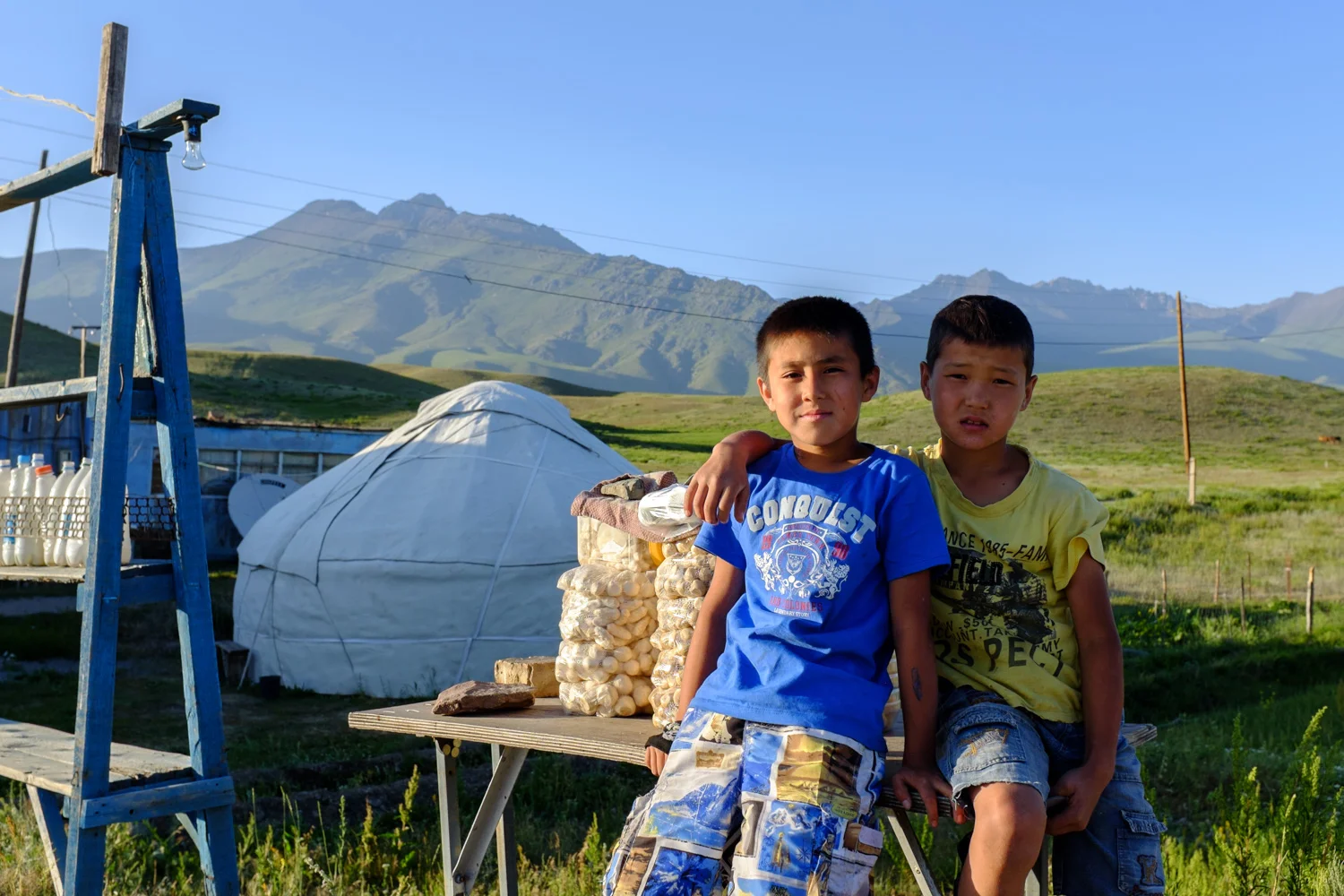 A couple boys selling koumiss and kurut