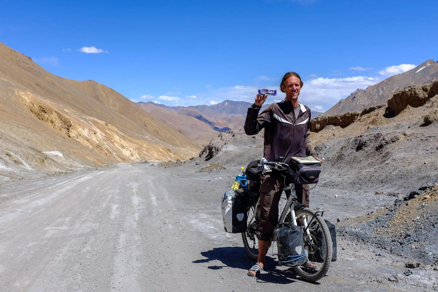 Sharing a Dali Bar with another cyclist on the Ak-Baital pass