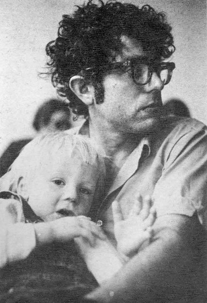 Bernie Sanders held his son during a meeting in 1971 with colleagues from The Vermont Freeman in Burlington, Vt. Photo Credit: Frank Kochman