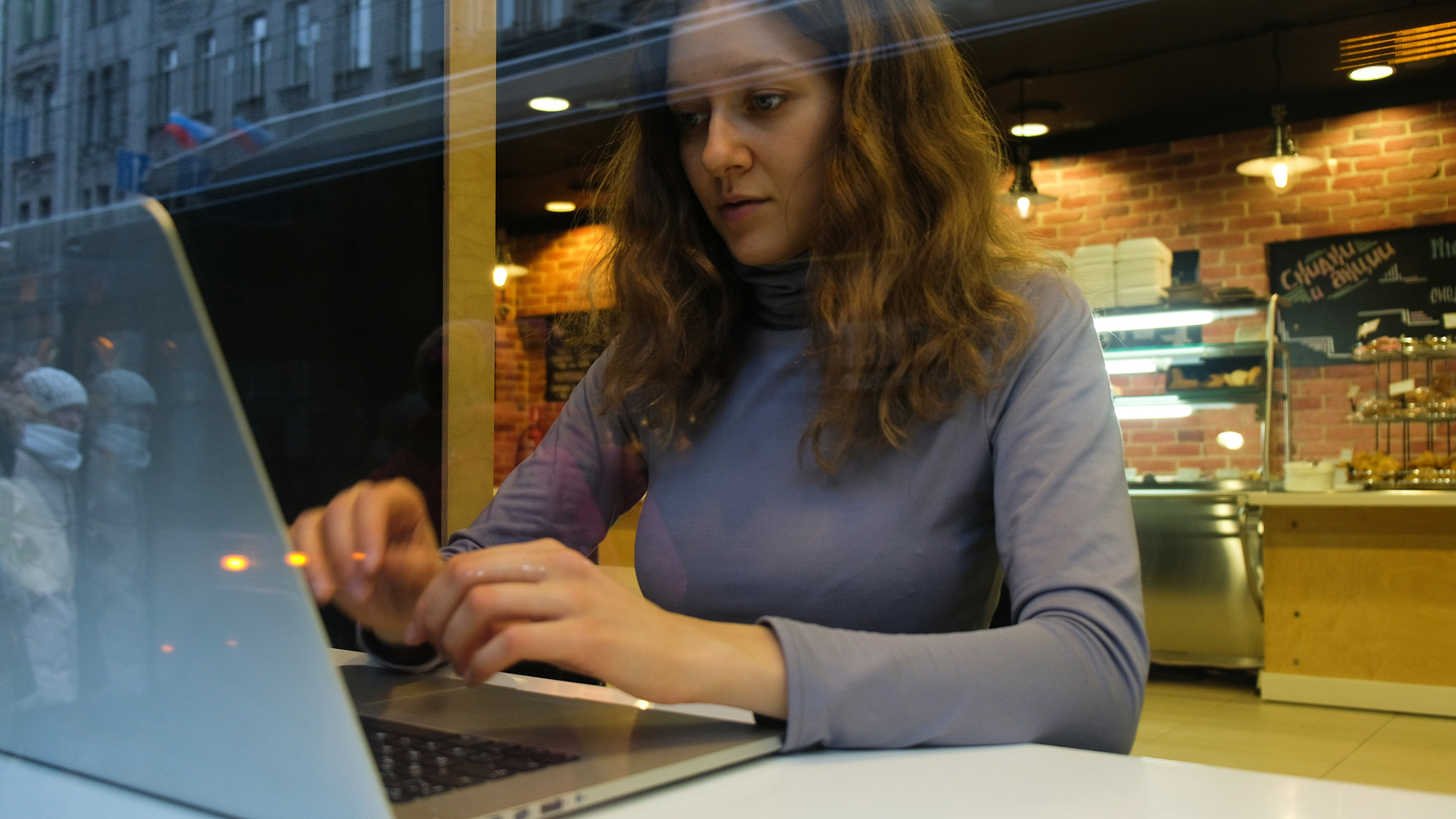 Woman taking a free online course