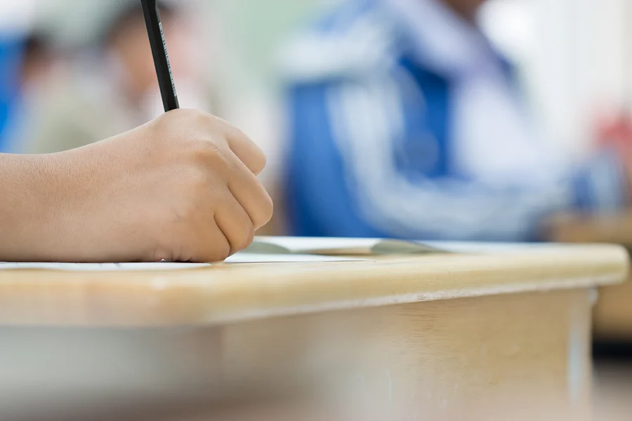 college student answering an exam