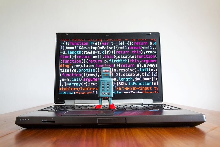 bigstock-Robot-With-Source-Code-Screen--261285631.jpg