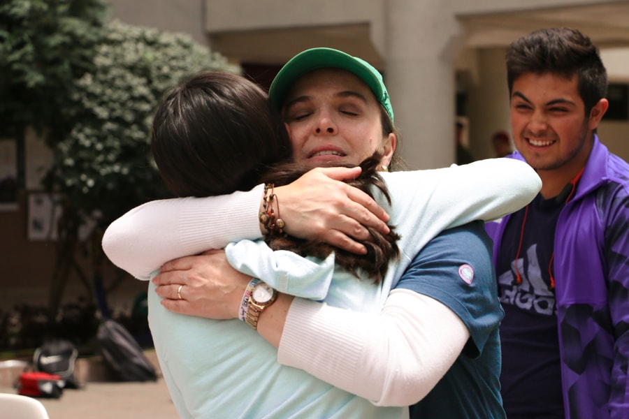 Teacher and student hugging in RULER day