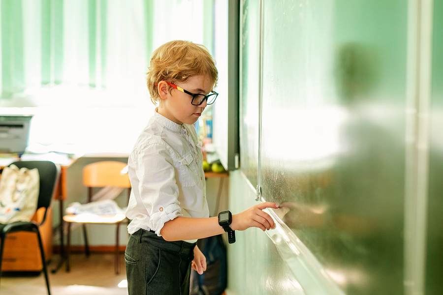 bigstock-Caucasian-Schoolboy-Doing-Exer-312709243.jpg