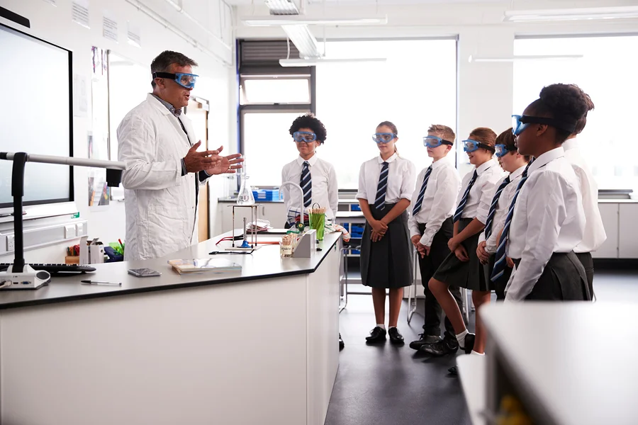 bigstock-Male-High-School-Tutor-Teachin-261747658.jpg