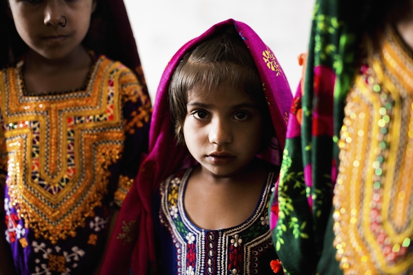 Four-year-old Benazir attends class with boys and girls of different ages in Haji Saleh Jat.