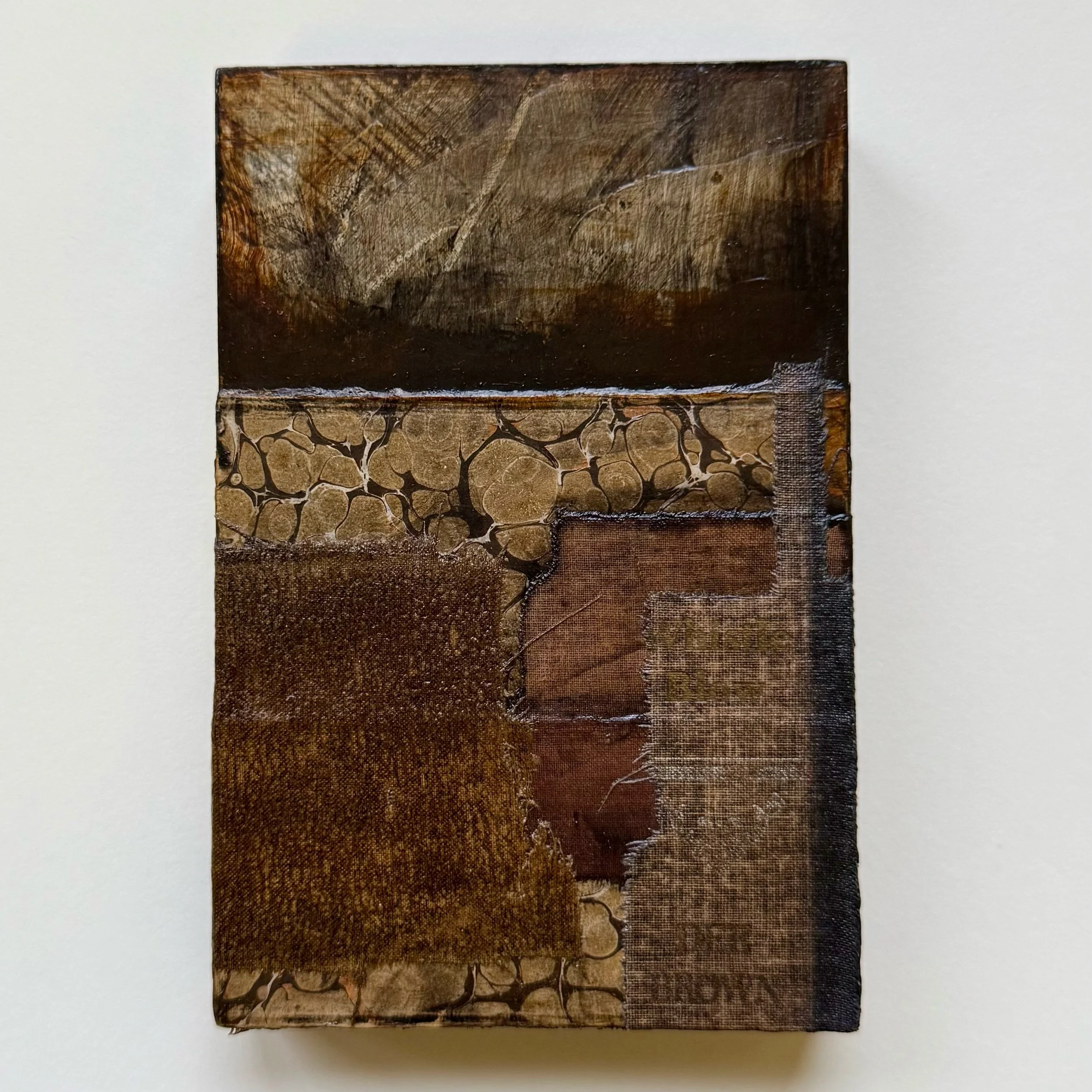  VINTAGE BOOK COLLAGE ON CRADLED WOODEN PANEL  5” x 7” x 1”  $250     