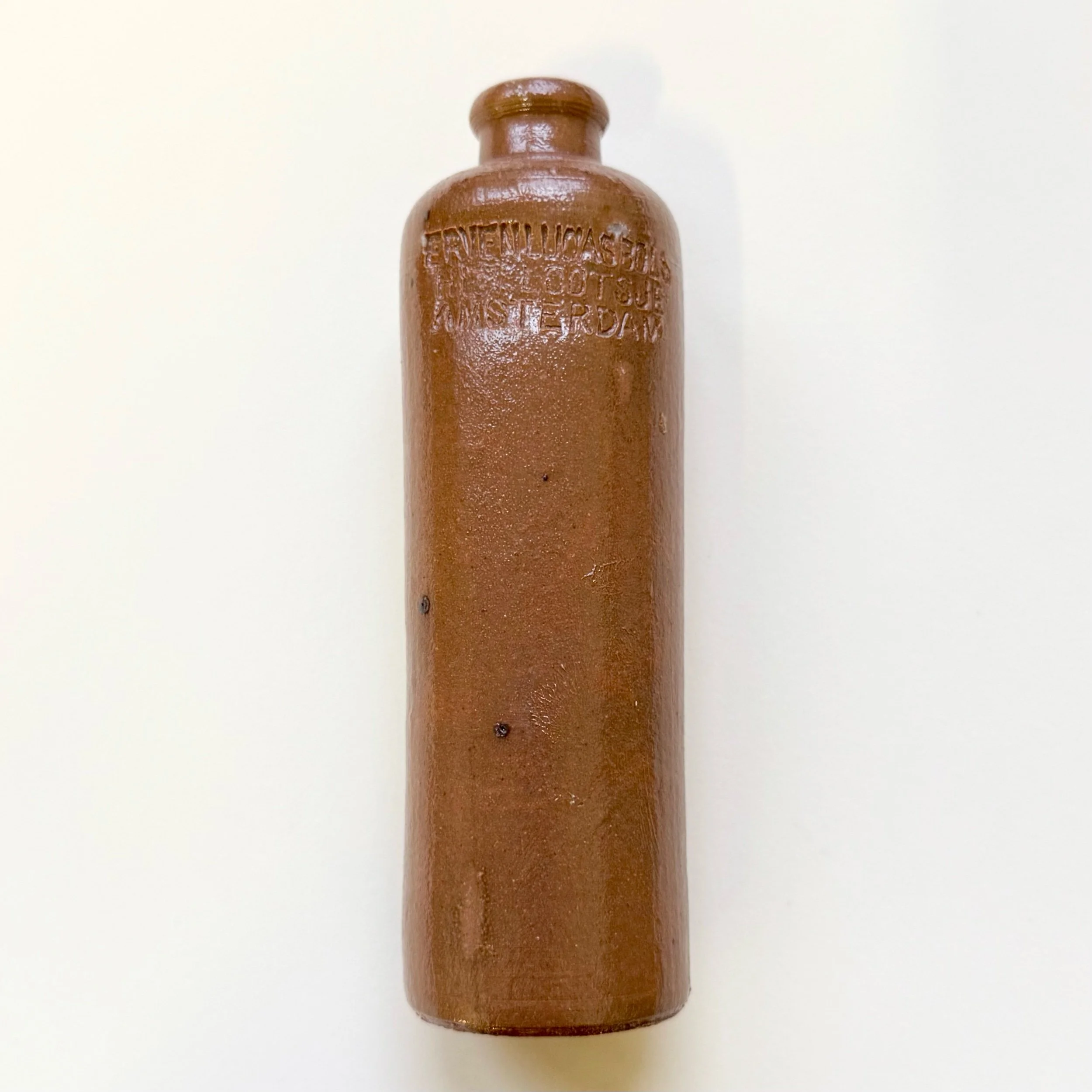  VINTAGE STONEWARE BOTTLE FROM AMSTERDAM  2” x 6”  $40   