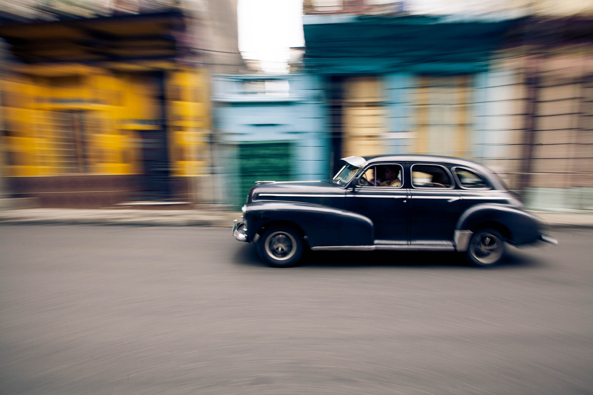 LA HABANA VIEJA Cuba’s image in the U.S. is strongly rooted in time warping visuals of vintage American cars, historic buildings and classic street scenes. While there is an undoubted beauty in these scenes, they also reflect more of the local financial reality than our eyes could initially comprehend. Cuba functions on two separate currencies. Cuban pesos, or nacionales (MN), are the money of the people. Citizens employed through the government are paid in nacionales. The other coin, largely known as the CUC (convertibles), was created specifically for tourists and initially set to be 1 to 1 with the U.S. dollar. To put the divide into perspective, 1 CUC = 24 pesos (MN). These extremes in the financial system affect what travelers represent, which can influence the local/tourist dynamic.