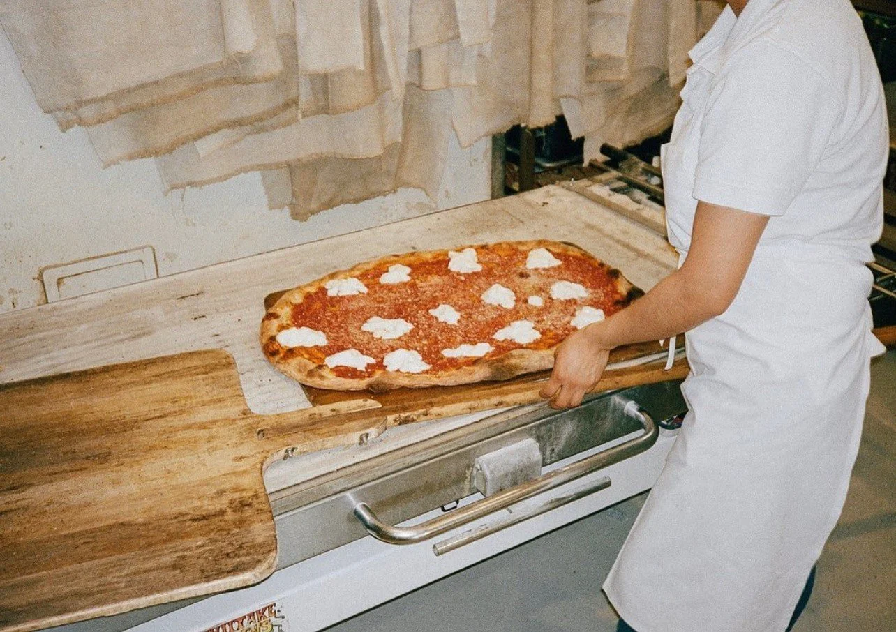 @gjustabakery serving up afresh  and delicious pomodoro pizza. 

Originally opened in 2014 to supply their restaurants, Gjelina and GTA, with bread and pantry items, Gjusta quickly became the popular California deli, bakery, caf&eacute;, and market i