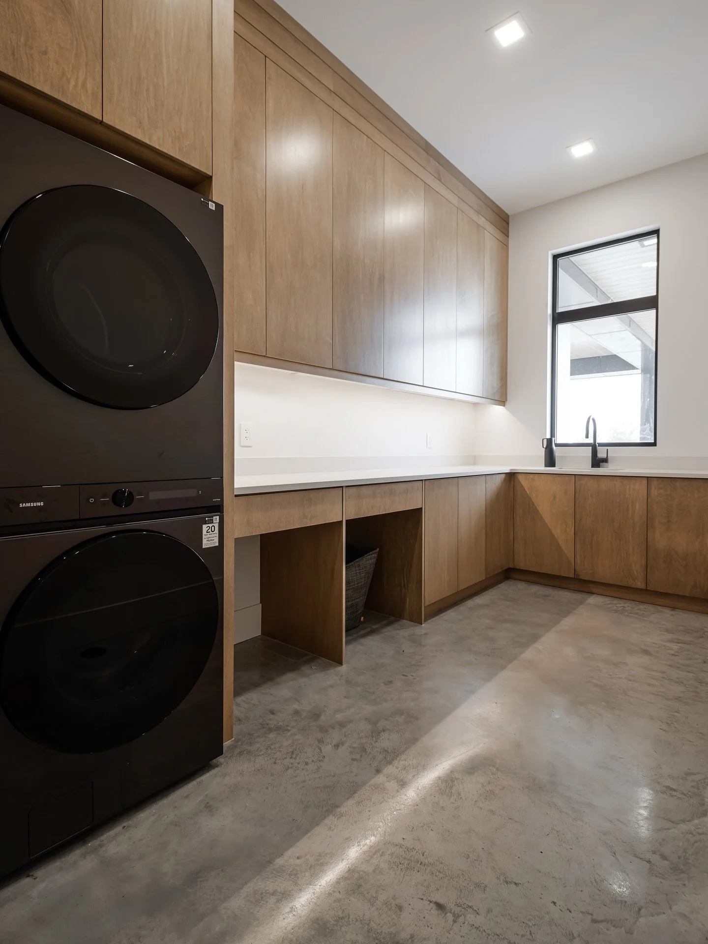 ✨ DESIGN TIP TUESDAY ✨ 

𝘎𝘰 𝘝𝘦𝘳𝘵𝘪𝘤𝘢𝘭.

Stacking your washer and dryer, paired with ceiling-height cabinetry, maximizes storage, keeps the space streamlined, and makes even small laundry rooms feel intentional.

#DesignTipTuesday #LaundryRoo