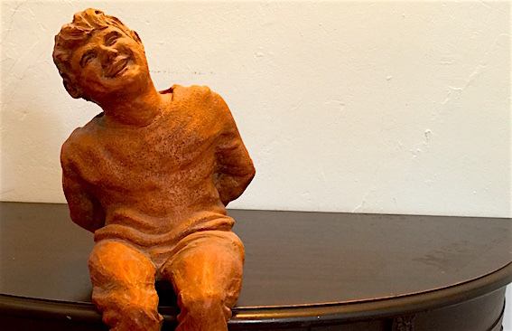 The statue of Daron Hagen sculpted by his mother when he was a boy.