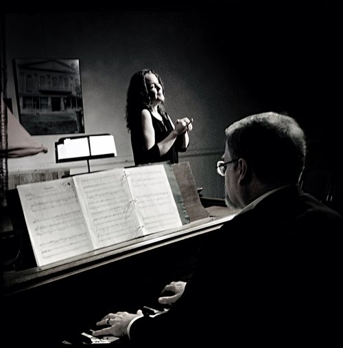 Accompanying Gilda Lyons.