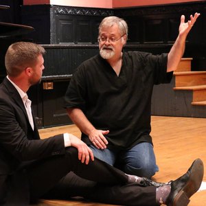 Conducting a masterclass.