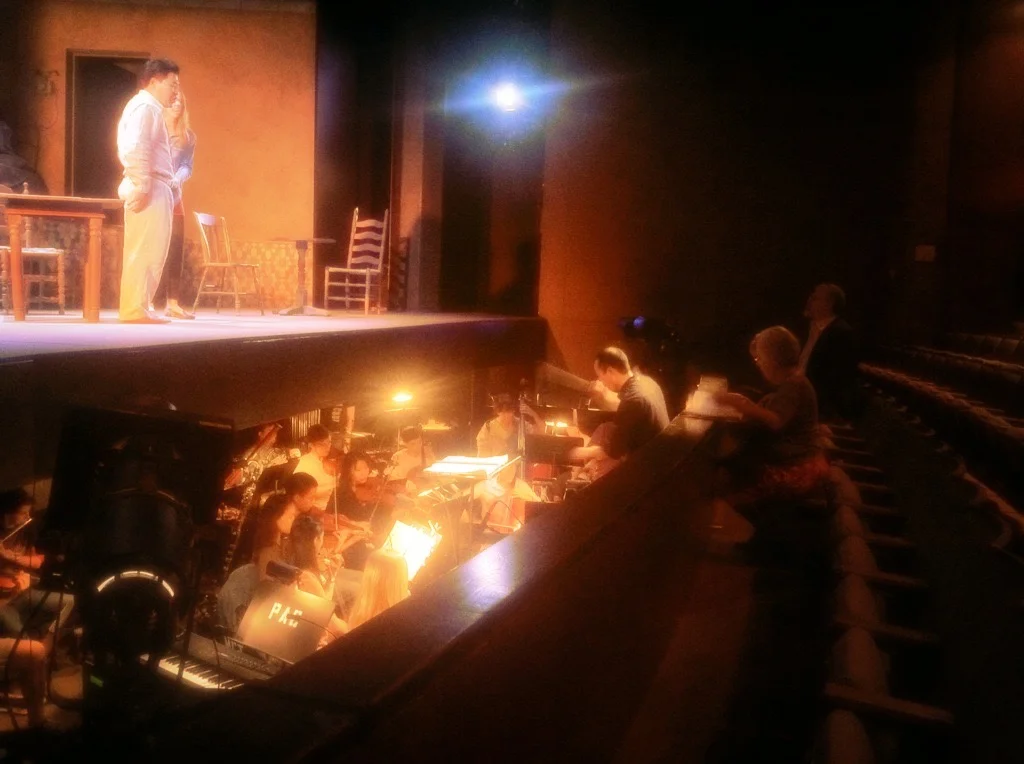 Kelly Kuo rehearses "A Woman in Morocco" at the Butler Opera Center as I observe, flanked by the production's vocal coach Kathy Kelly.