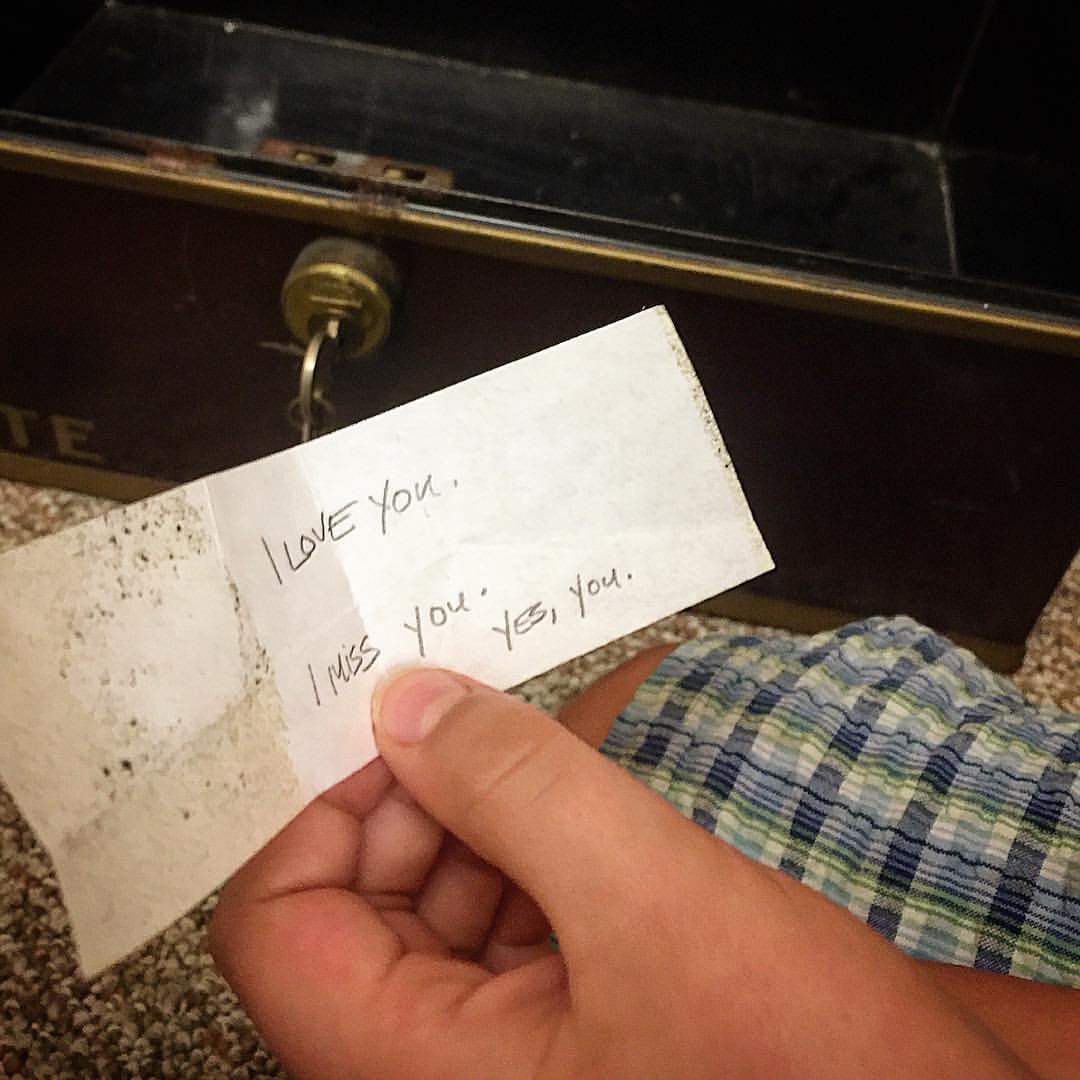My younger son draws from the lead-lined treasure chest in the library the note that has resided there for a long time and left, as far as he was concerned, just for him. And, at Yaddo, why not? (Photo credit: Hagen Collection)
