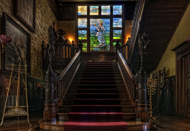 The Grand staircase. Katrina Trask is portrayed in the Tiffany window. (Photo credit: Hagen Collection)