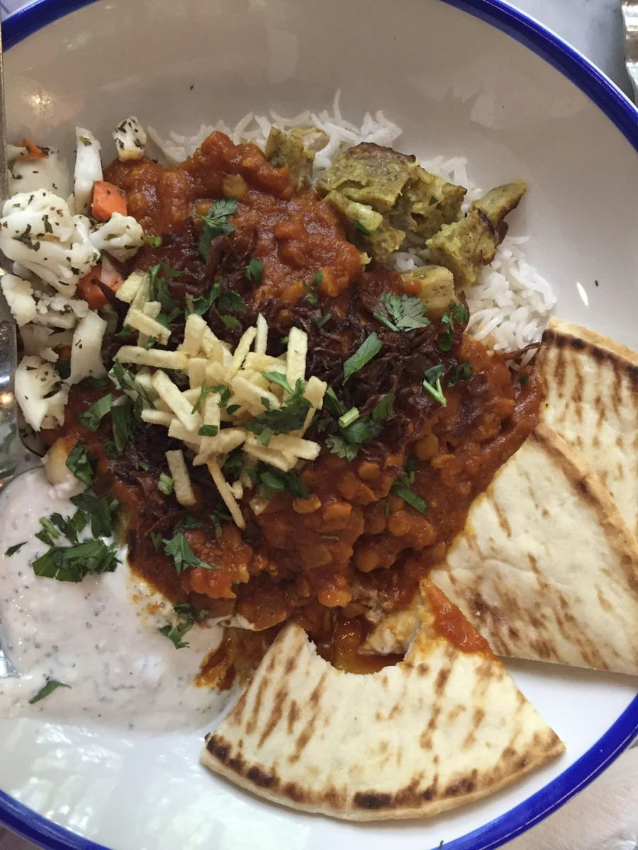 Cherry Street Coffee House, I believe I got the gorhem sabzi - A tangy, savory, citrusy stew that combined sautéed herbs,&nbsp;with kidney beans &amp; sun dried limes, served with house pickled veggies and I thought I chose "chicken" but I'm pretty …