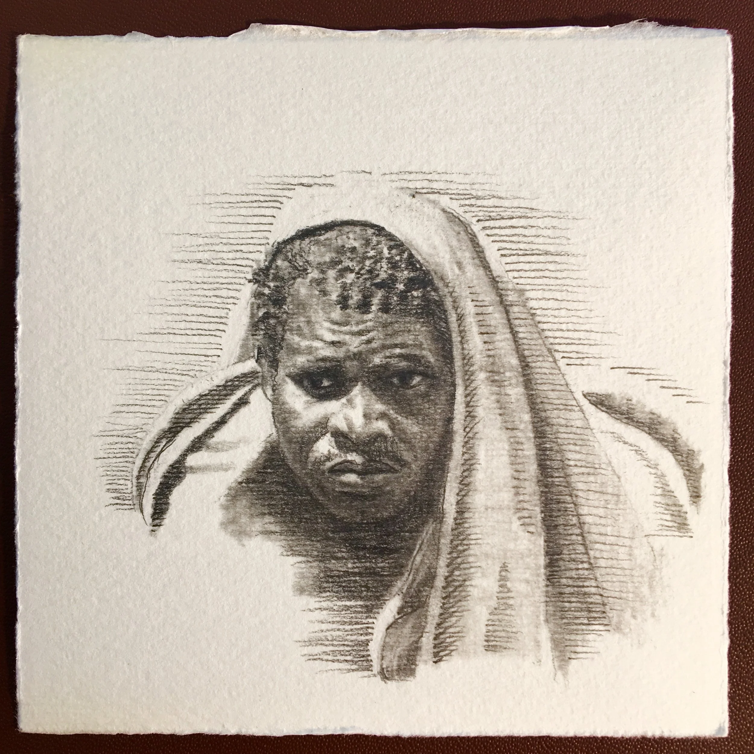 Migrant with Towel.jpg