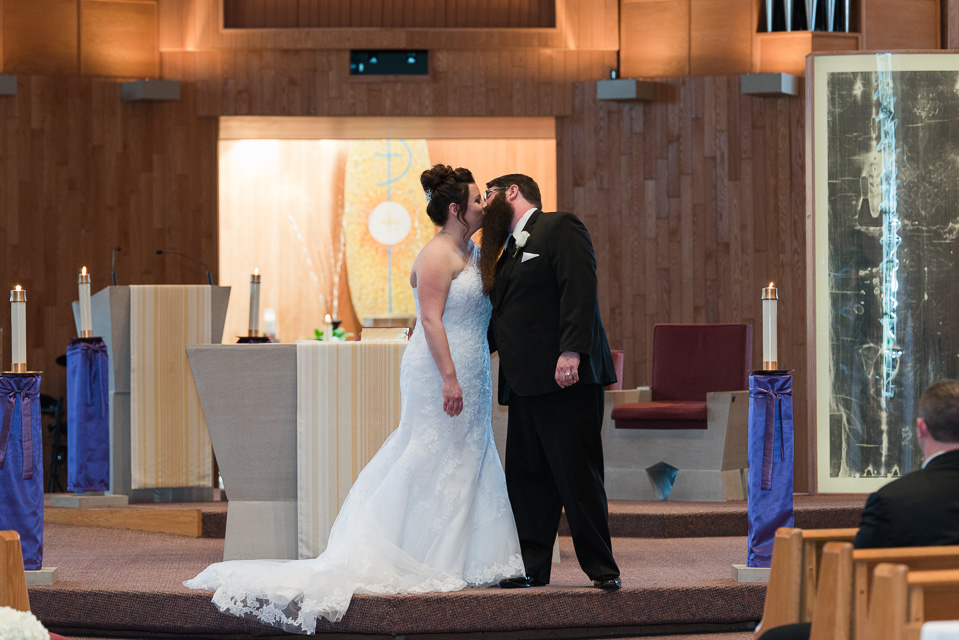 17.04.01_Napela Wedding-28bride, ceremoy, church, first kiss, Groom, Lapum-Napela Wedding, livonia, michigan.jpg