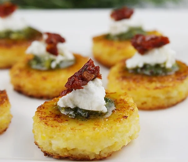 appetizing bites - Move over cheese and crackers, there's a new starter in town. I am admittedly obsessed with these Sundried Tomato Polenta Bites from Recipe Girl. When sundried tomatoes and goat cheese are two of your favorite things, what's not to love? I make this recipe even quicker by using Ancient Harvest GF Polenta & even a store bought dairy-free pesto when I'm really crunched for time.