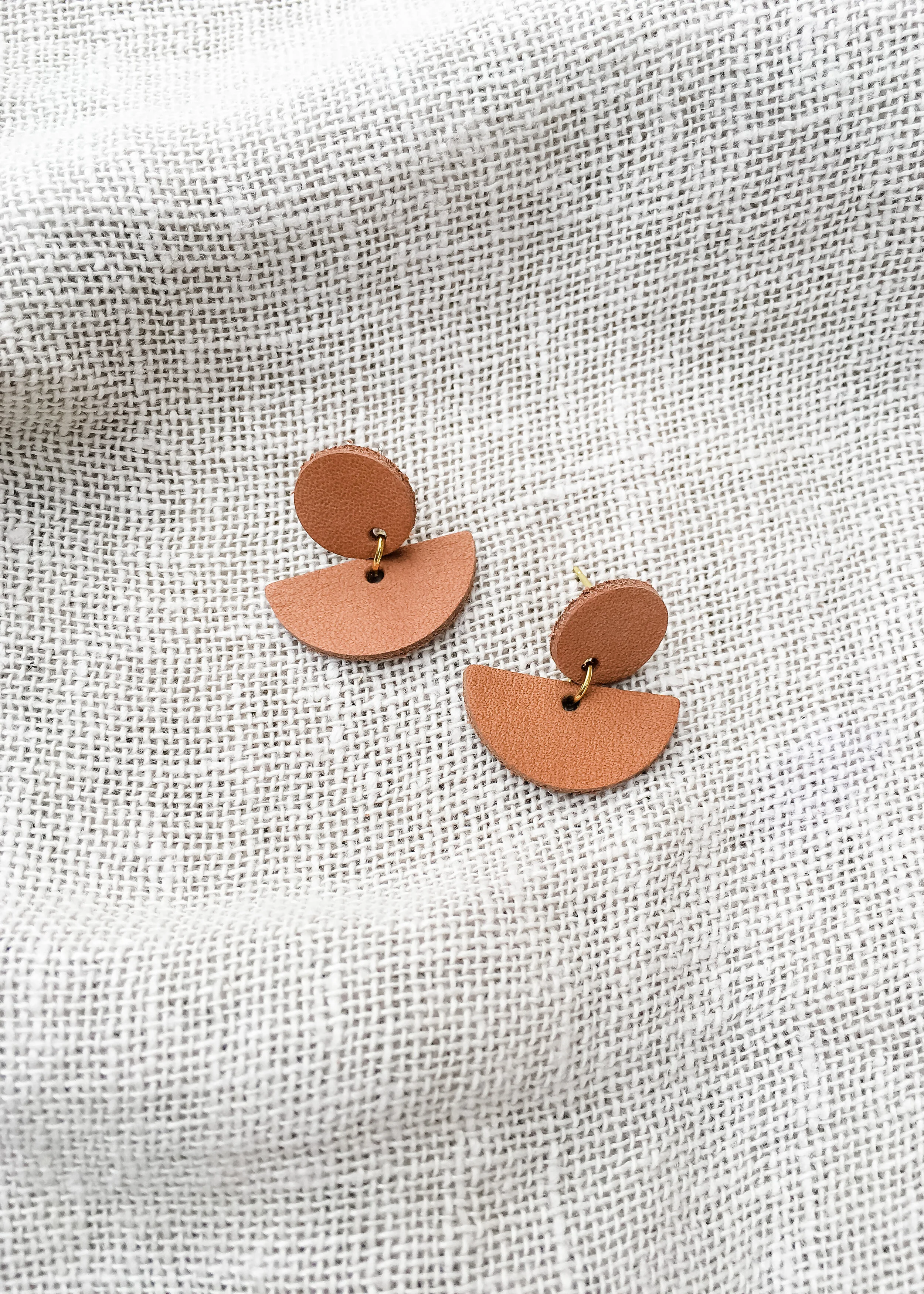half circle drop earrings tan