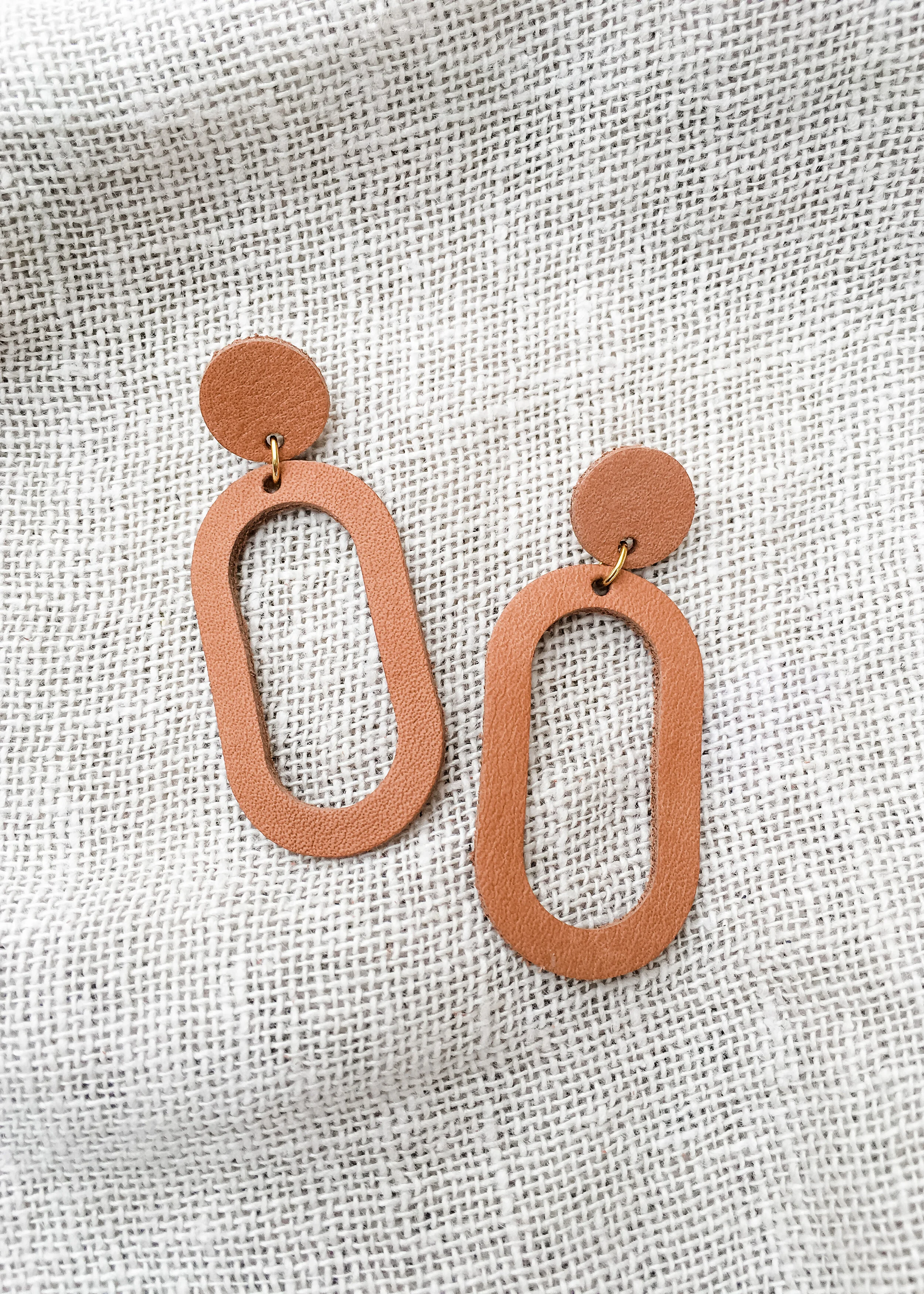 oval drop earrings tan
