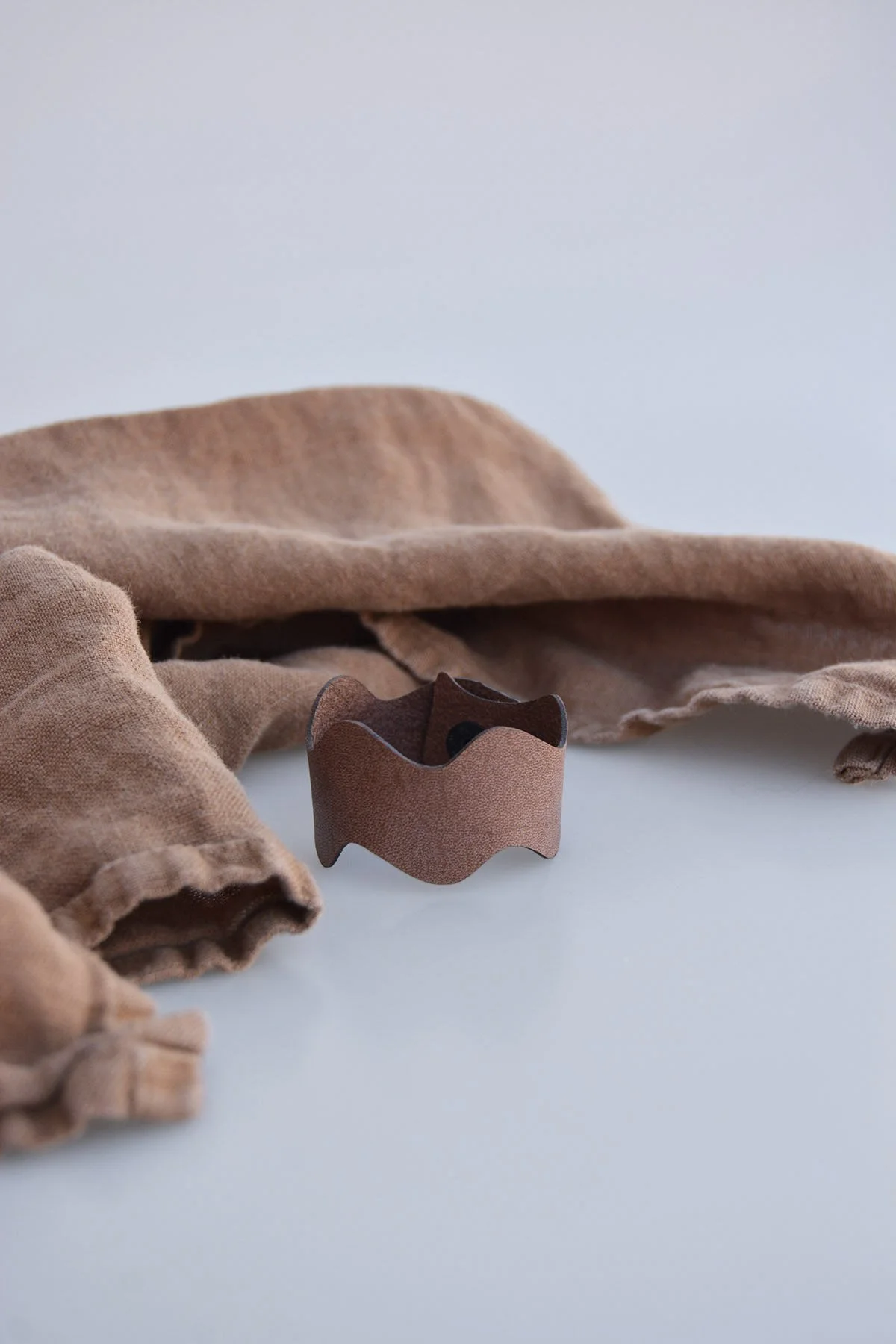 wavy-napkin-rings-brown.jpg