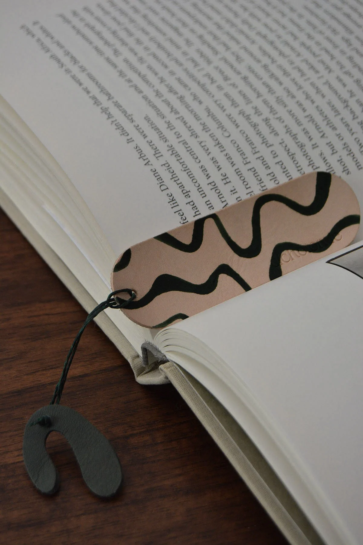 green-squiggle-bookmark-in-book.jpg