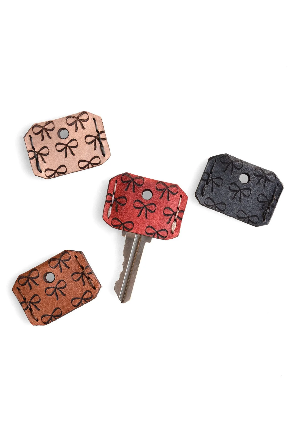 Etched Leather Bow Key Topper