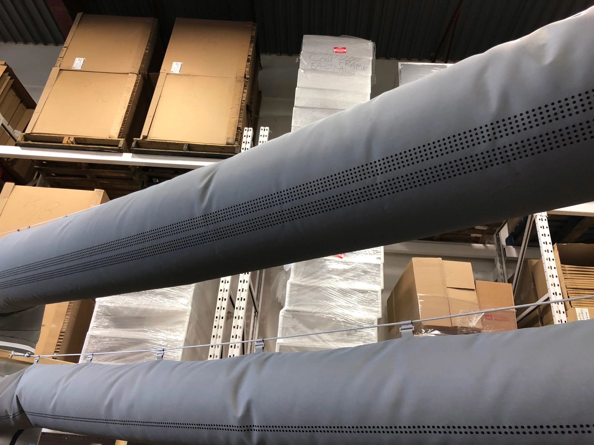  Multiple ducts of different sizes and airflow outlets. 