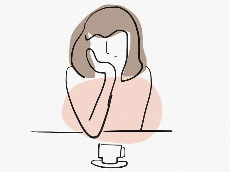 Line drawing of a woman with shoulder-length hair sitting at a table with her hand supporting her face, a cup in front of her, against a light background.