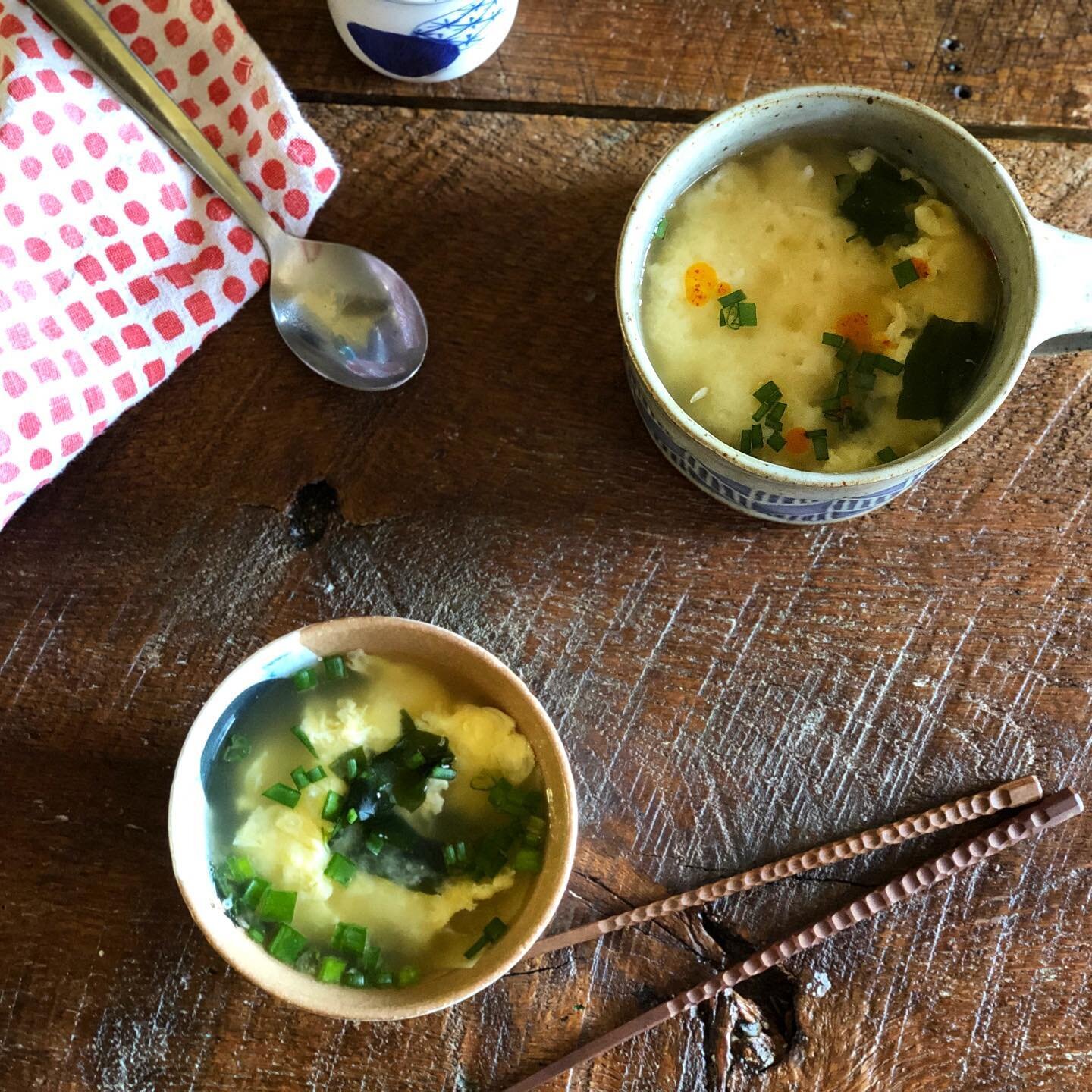 Lazy Sunday Morning Soup🥣 .
Broth, dropped egg , seaweed, spring onion and Rice Miso Soup 😋 .
in Japan, Rice and Miso soup in one bowl called &ldquo;NEKOMANMA&rdquo; which means Cat/dog meal. 😂 
Yes... in my childhood my mom used to give a dog lef