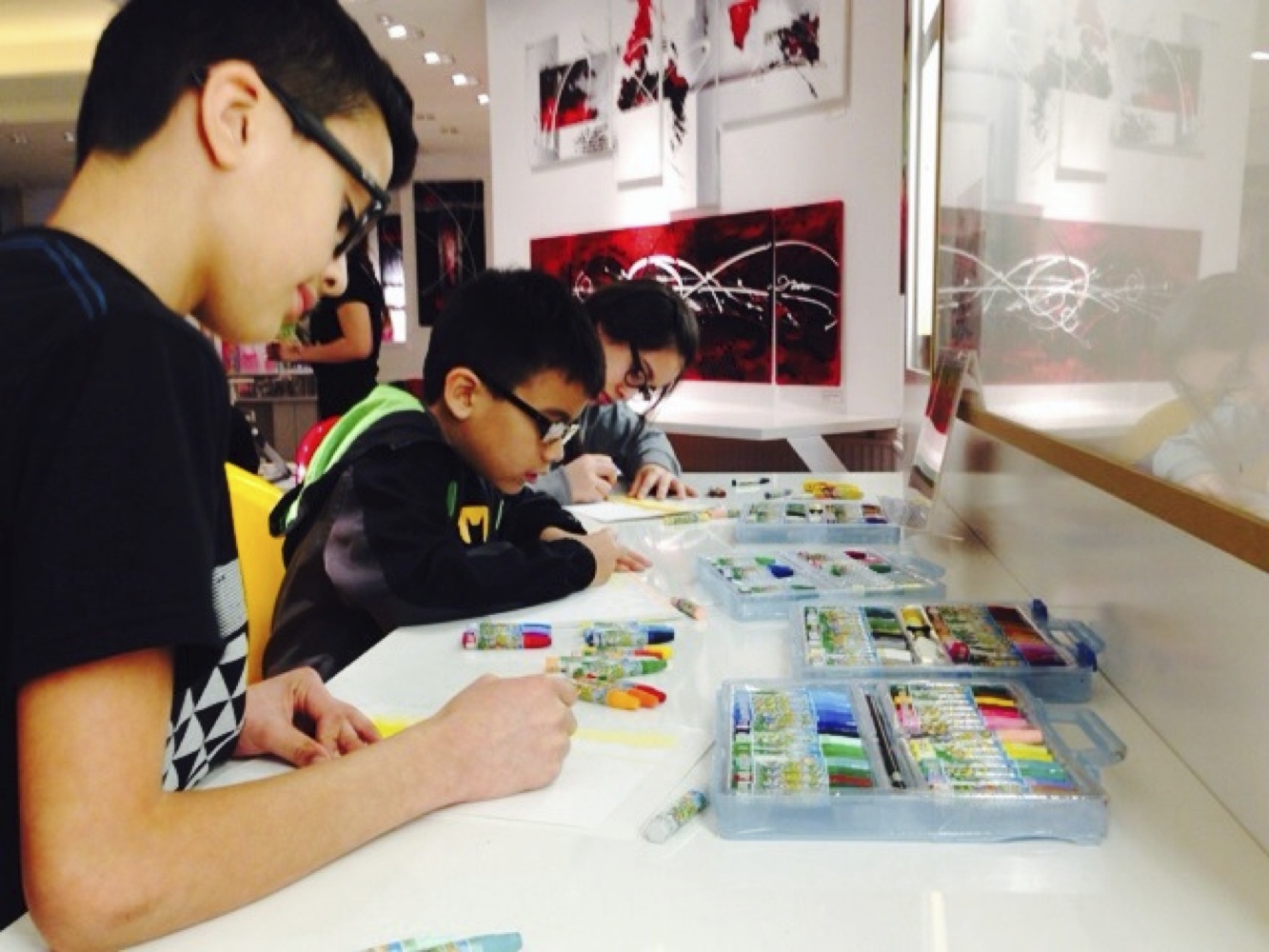 Image of students taking art class.
